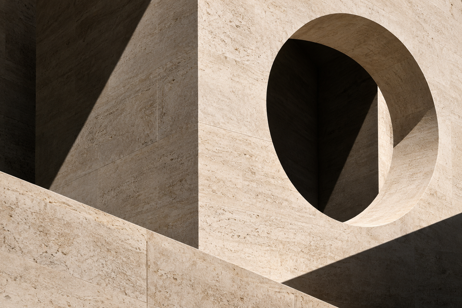 Sunlight crosses pale stone planes beneath a circular opening.